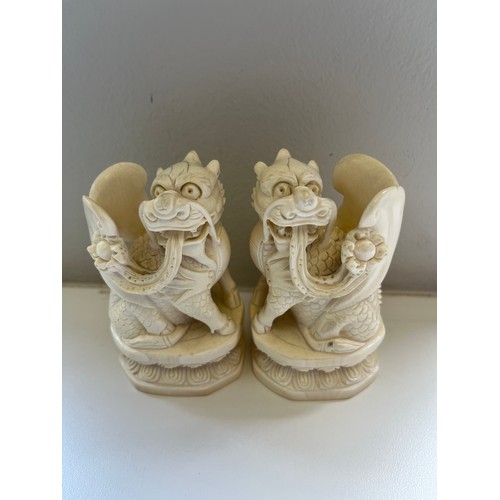 472 - A PAIR OF CHINESE MARINE TUSK CARVING'S OF A SEATED BIXI