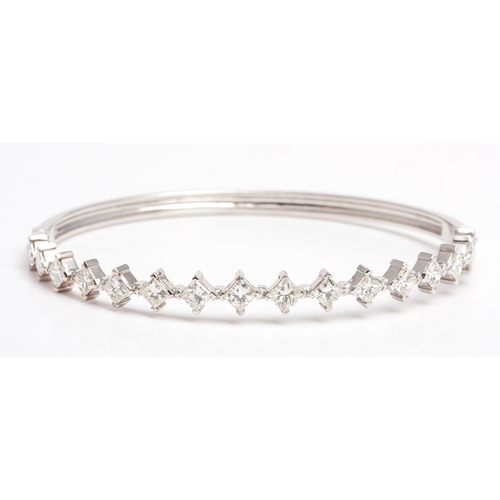 135 - A DIAMOND BANGLE, 3.45 CARATS