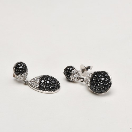 96 - A PAIR OF BLACK AND WHITE SWAROVSKI-STYLE EARRINGS