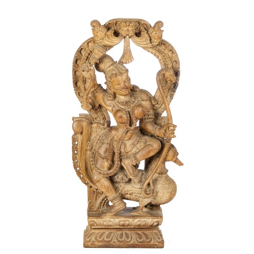 516B - AN INDIAN WOODEN CARVING OF A GODDESS