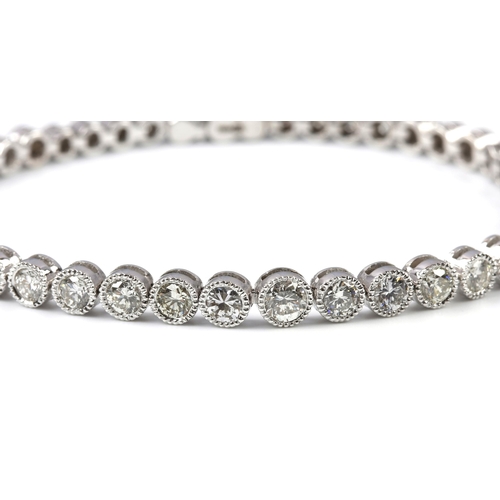 144 - A DIAMOND TENNIS BRACELET, 4.58 CARATS