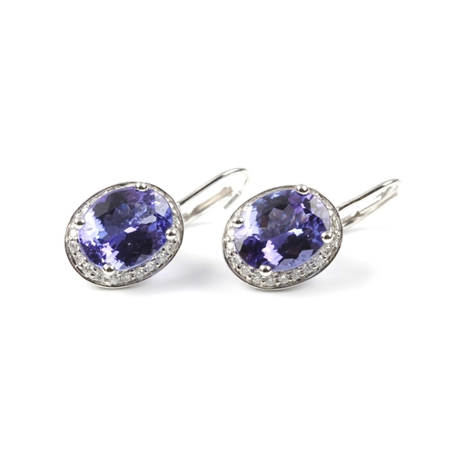 88 - A PAIR OF DIAMOND AND TANZANITE EARRINGS 