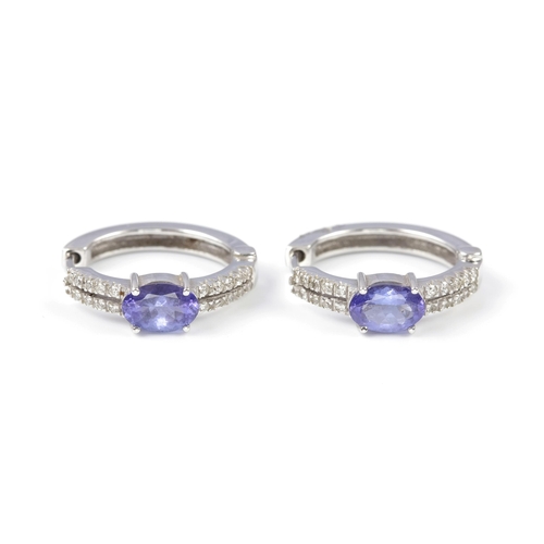 89 - A PAIR OF DIAMOND AND TANZANITE EARRINGS