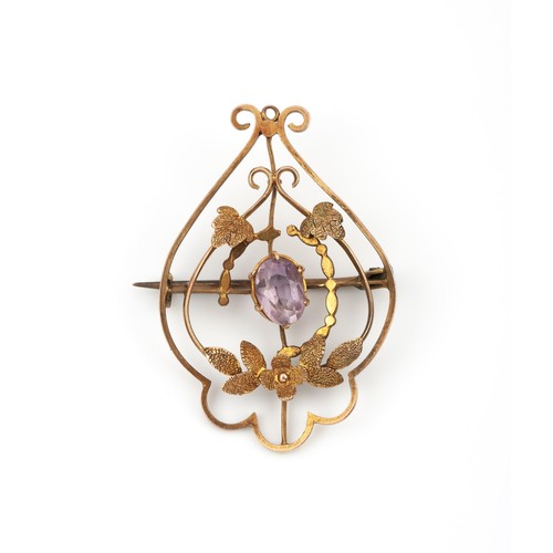 448 - A GOLD AND AMETHYST BROOCH