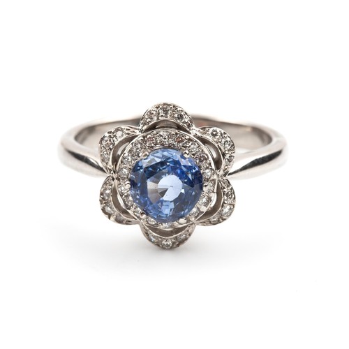 477 - A SAPPHIRE AND DIAMOND DRESS RING