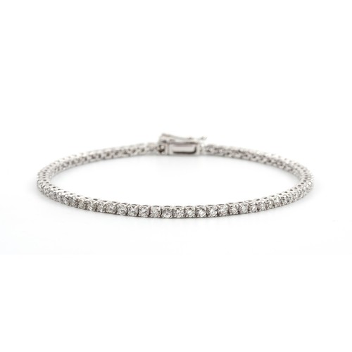 475 - A DIAMOND TENNIS BRACELET, 3.50 CARATS