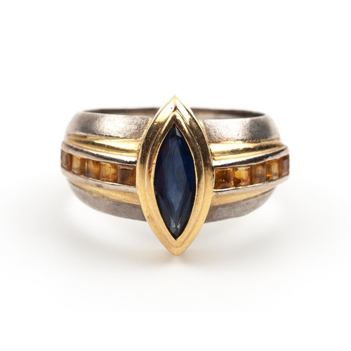 463 - A SIMULATED SAPPHIRE DRESS RING