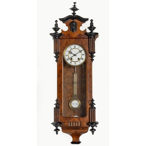 176 - A WALNUT AND EBONISED WALL CLOCK