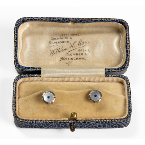 226 - A CASED PAIR OF COLLAR STUDS