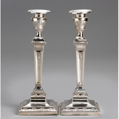 607 - A VICTORIAN SILVER PAIR OF CANDLESTICKS, RUPERT FAVELL, LONDON, 1891