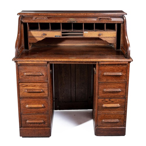 812 - AN OAK ROLLTOP DESK