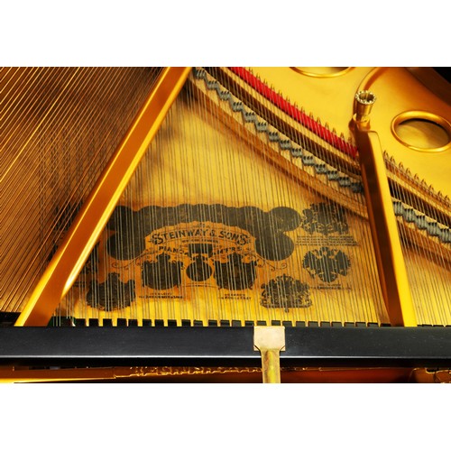 821 - AN EBONISED BABY GRAND PIANO, STEINWAY