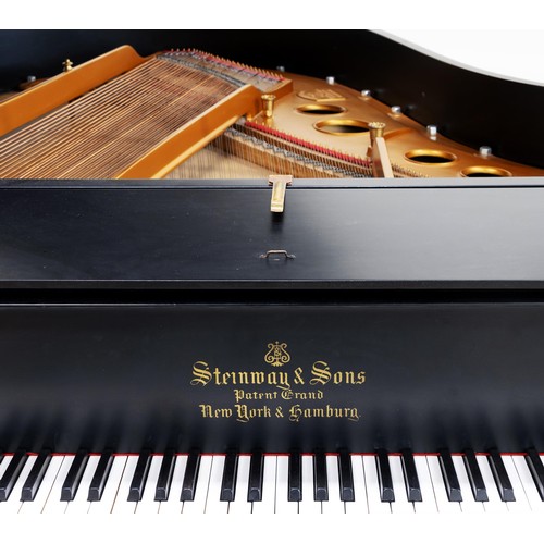 821 - AN EBONISED BABY GRAND PIANO, STEINWAY