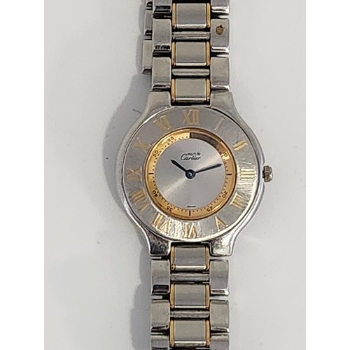 556 - A LADIES STAINLESS STEEL WRISTWATCH, 21 MUST DE CARTIER