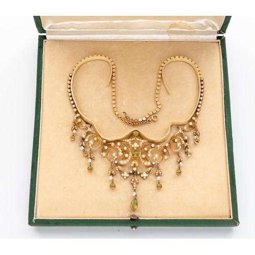 691 - A CASED PERIDOT AND SEED PEARL NECKLACE