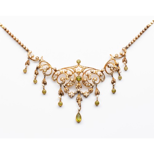 691 - A CASED PERIDOT AND SEED PEARL NECKLACE