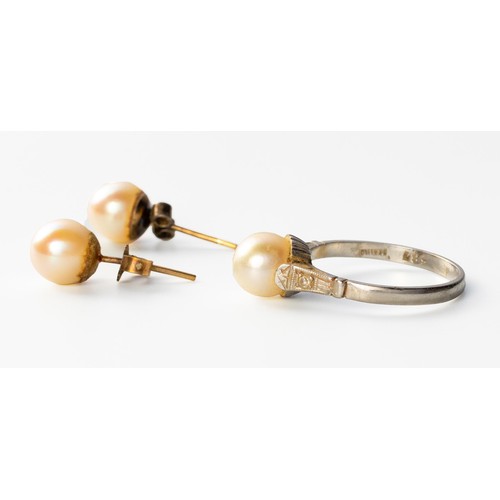 674 - A PEARL AND DIAMOND RING