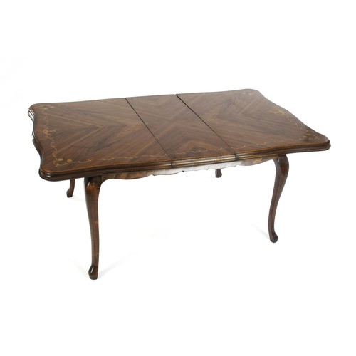 361 - A WALNUT VENEERED EXTENDING DINING TABLE, 20TH CENTURY