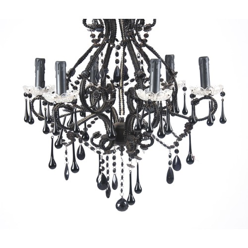 858 - A BLACK GLASS SIX-LIGHT CHANDELIER