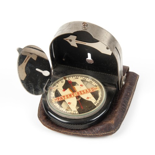 208 - A CASED COMPASS