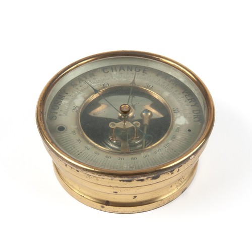 202 - A BRASS ANEROID BAROMETER