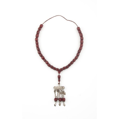 694 - A CHERRY AMBER NECKLACE