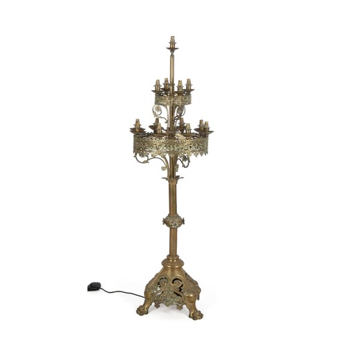 397 - A 19TH CENTURY EUROPEAN CHURCH FLOOR STANDING CANDELABRA WHICH HAS BEEN LATER ELECTRIFIED.