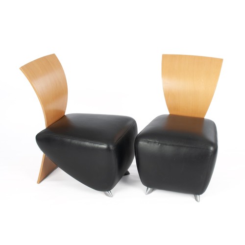 A PAIR OF DESIGNER BEECHWOOD AND BLACK-LEATHER SIDE CHAIRS