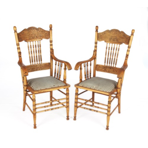 347 - A PAIR OF AMERICAN PRESSED FRUITWOOD ARMCHAIRS