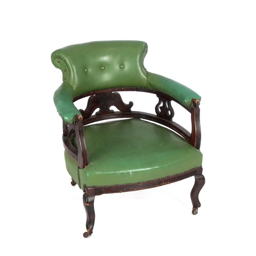 323 - A LATE VICTORIAN GREEN-LEATHER AND MAHOGANY TUB CHAIR