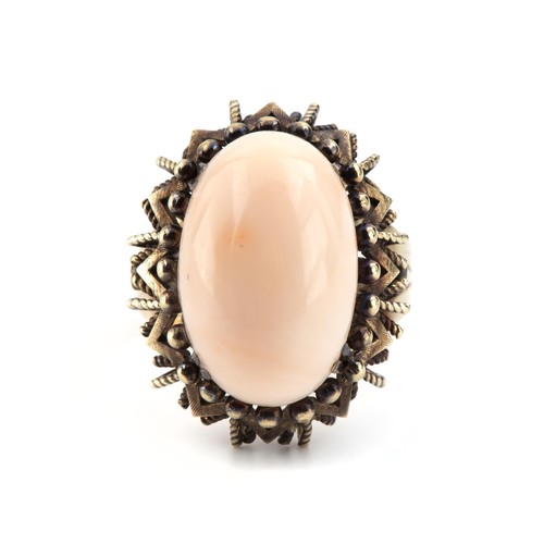 709 - A CORAL DRESS RING, CIRCA 1970