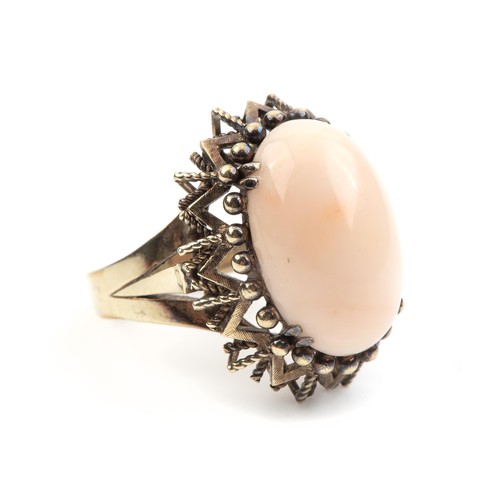 709 - A CORAL DRESS RING, CIRCA 1970