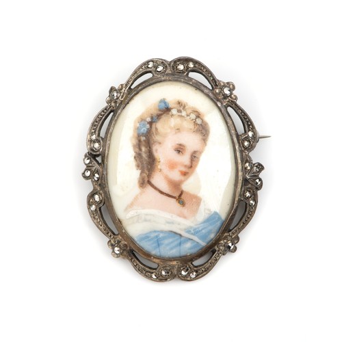 706 - A PORCELAIN BROOCH, LIMOGES, FRANCE,19TH CENTURY