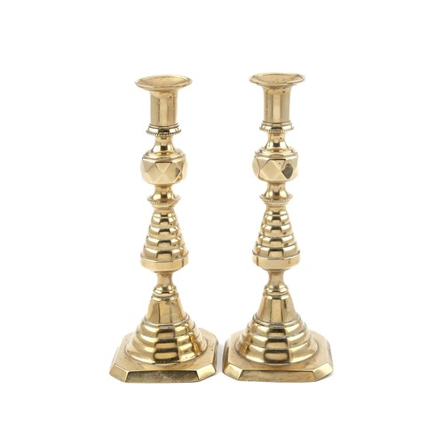 224 - A PAIR OF BRASS CANDLESTICKS