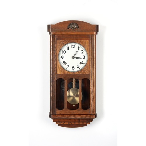 270 - AN OAK CHIMING WALL CLOCK, EARLY 20th CENTURY