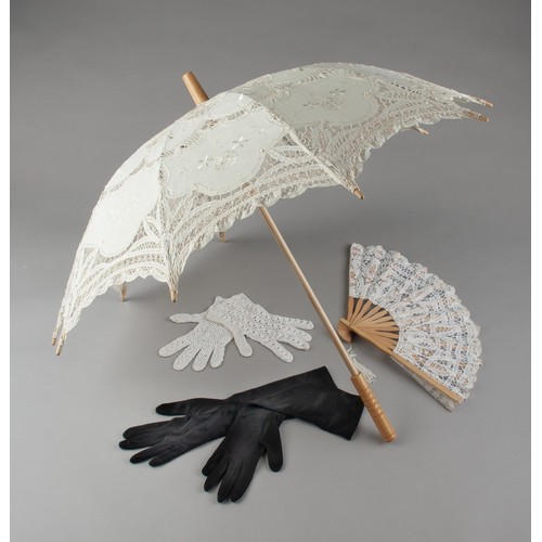 234 - A LACE PARASOL, A LACE FAN, A PAIR OF LACE GLOVES AND A PAIR OF CROCHET GLOVES