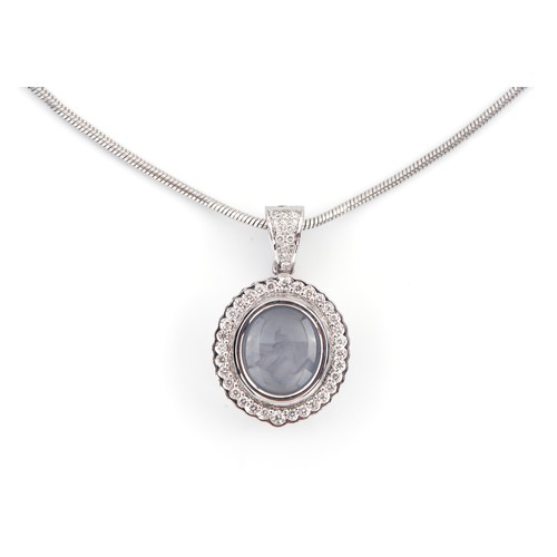 776 - A DIAMOND AND SAPPHIRE PENDANT