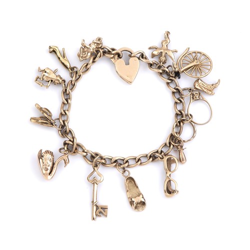 724 - A GOLD CHARM BRACELET