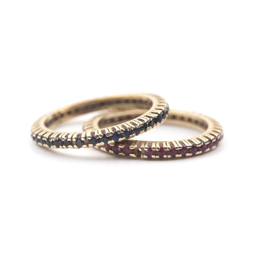 A PAIR OF MATCHING ETERNITY BANDS