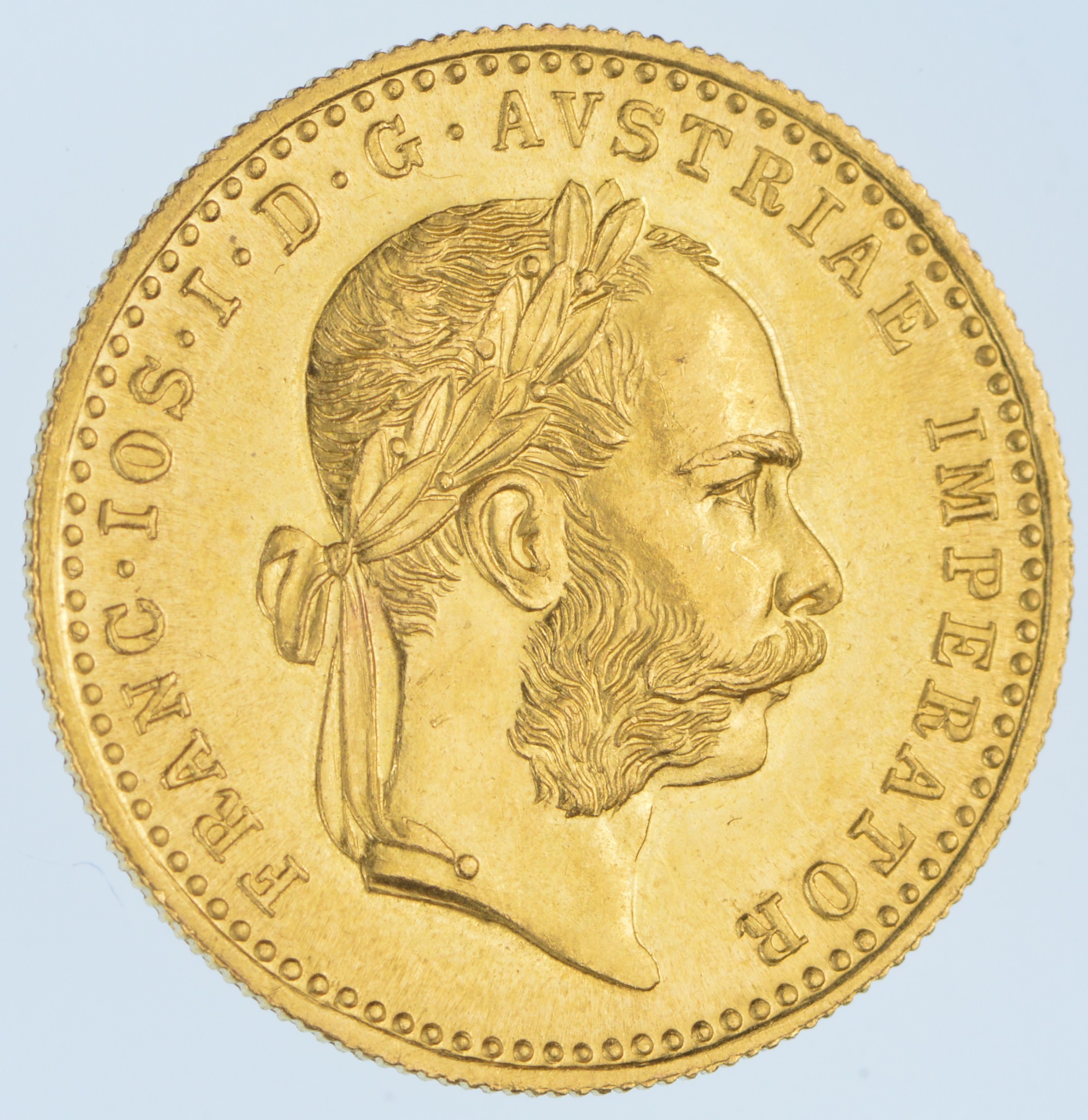 AN AUSTRIAN GOLD COIN