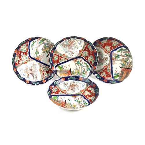 729 - A SET OF FOUR JAPANESE HAND PAINTED IMARI PLATES, 19TH C