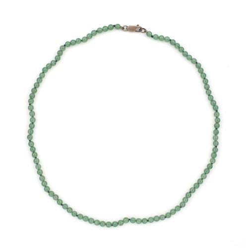 1214 - A STRAND OF JADE-LIKE BEADS