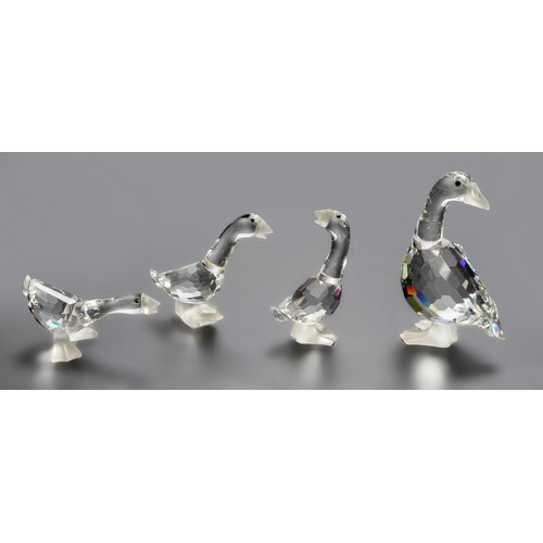 771 - A GROUP OF FOUR SWAROVSKI GEESE