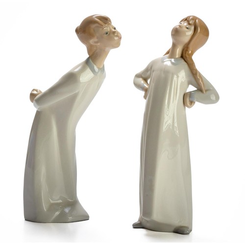 TWO LLADRO FIGURES OF A KISSING BOY AND A GIRL