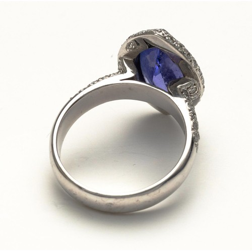 1021 - A TANZANITE AND DIAMOND DRESS RING