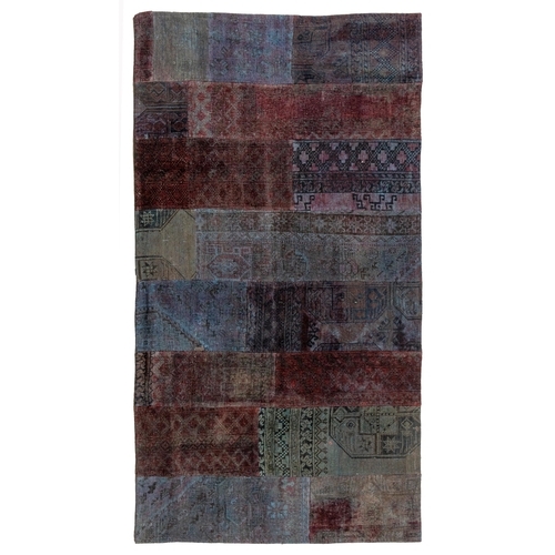 187 - A PATCHWORK RUG&nbsp;251 by 123cm