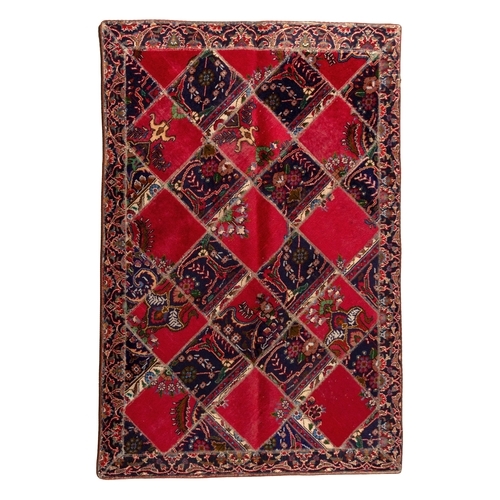 207 - A PATCHWORK RUG 218 by 115cm