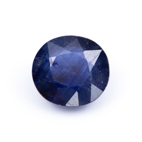 1442 - AN UNSET SAPPHIRE, 5.60 CARATS