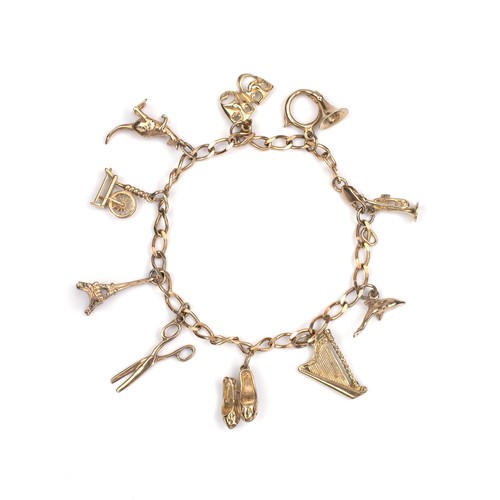 1341 - A GOLD CHARM BRACELET