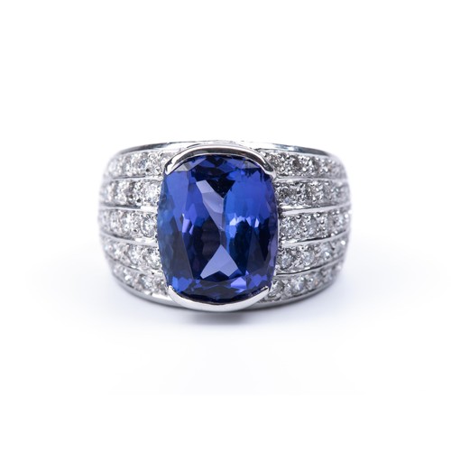 1020 - A TANZANITE AND DIAMOND DRESS RING